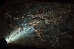 A luminous hand-drawn map of a complex interconnected system with a single flashlight illuminating one corner, evoking making complexity legible rather than simple