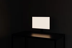 A dark room with one monitor showing a blank white screen, evoking a site rendered blank by a security policy