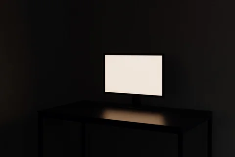 A dark room with one monitor showing a blank white screen, evoking a site rendered blank by a security policy