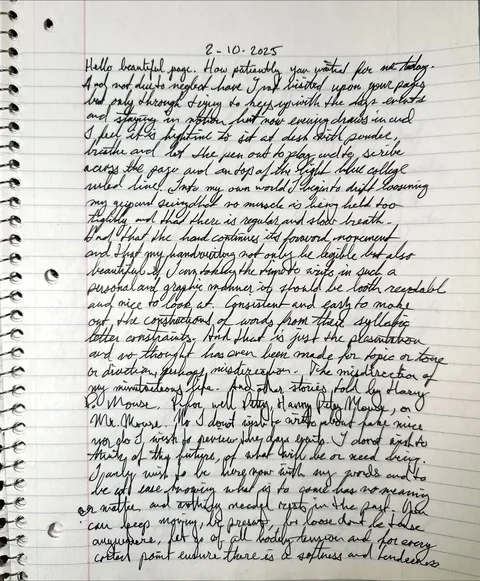 Spiral notebook page headed 2-10-2025 that opens with Hello beautiful page, a full page of black cursive on lined paper