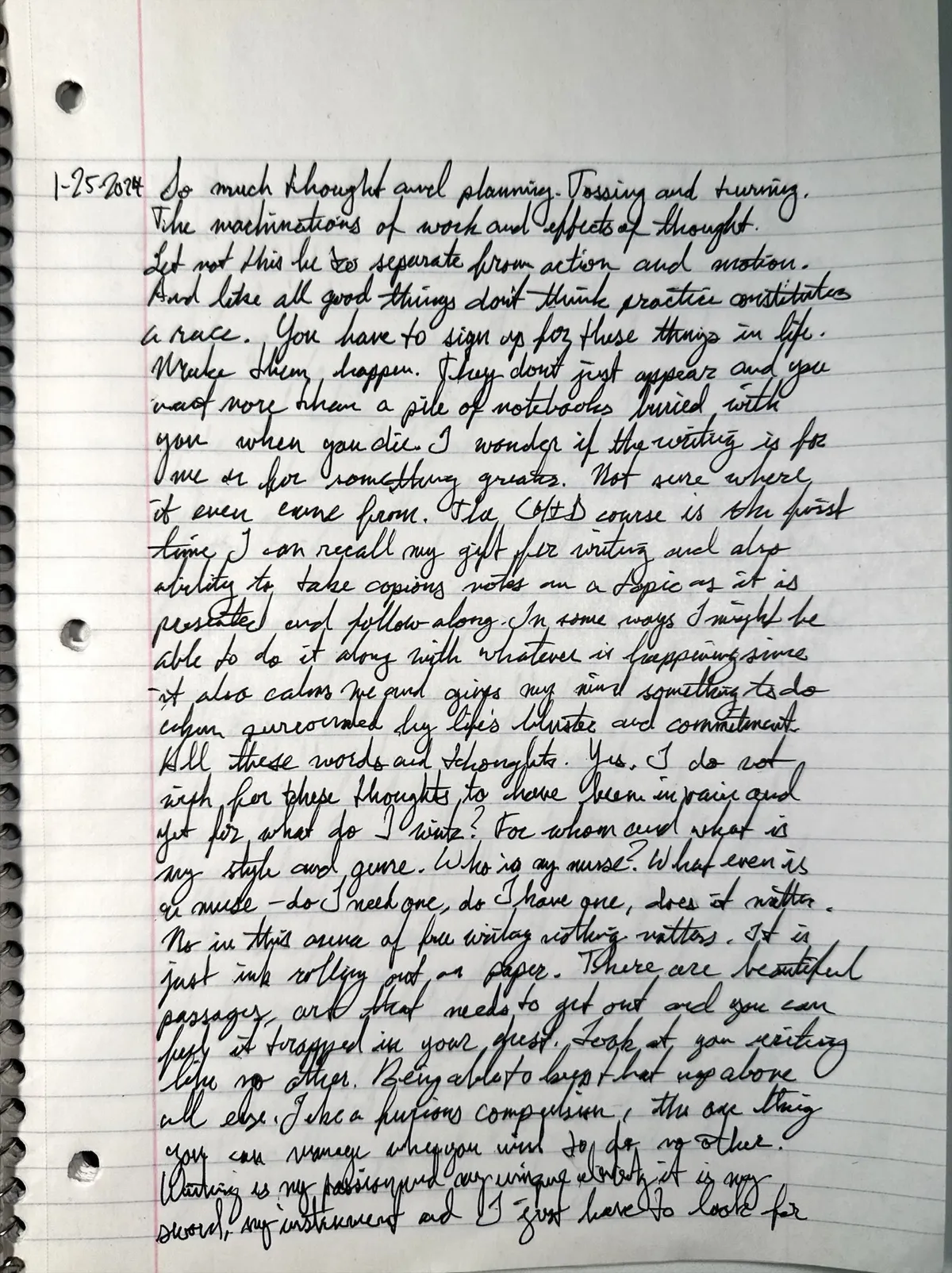 Spiral notebook page with a date in the left margin, a full page of even black cursive on lined paper